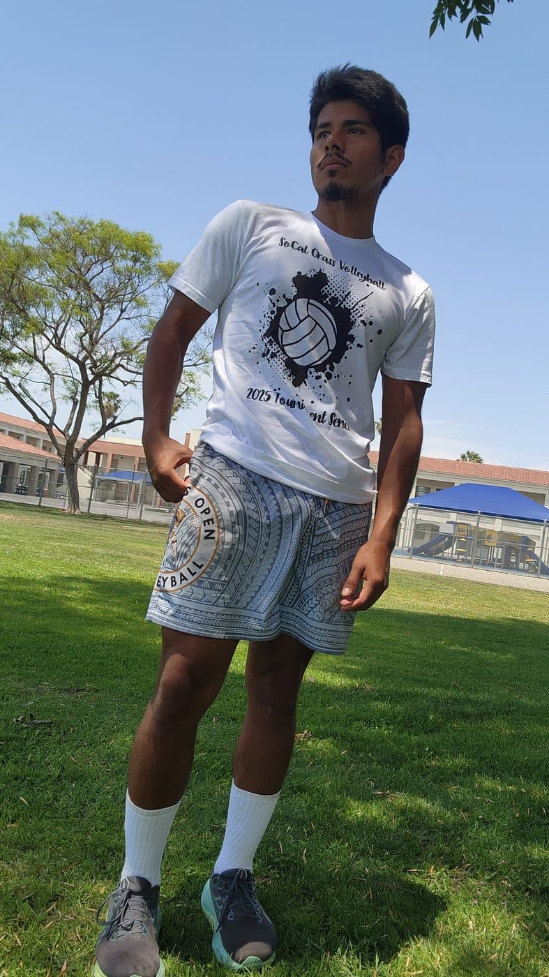 Omar in his tournament series shirt out on the grass